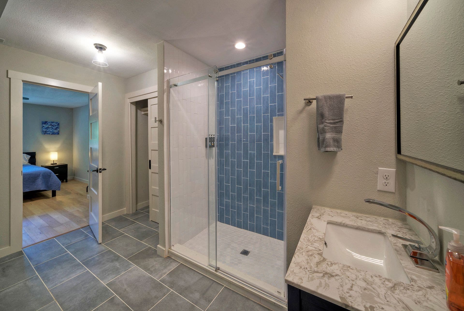 Walk-in tiled shower in a River Bend Bliss bathroom